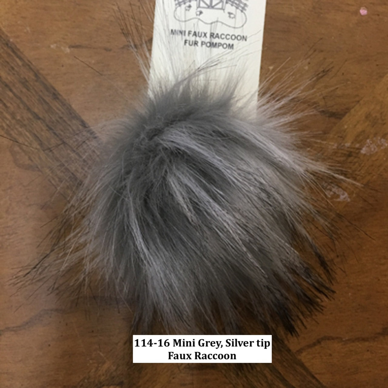 McPorter Faux Fur Pom Pom